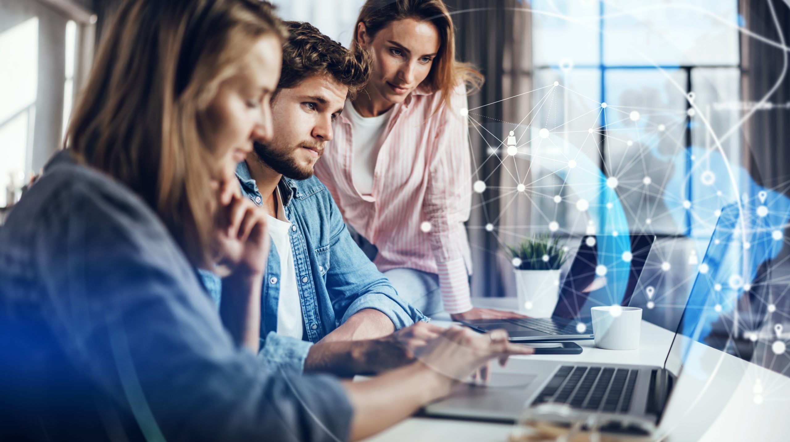 Group of modern business people working together on a project. Networking. Startup concept
